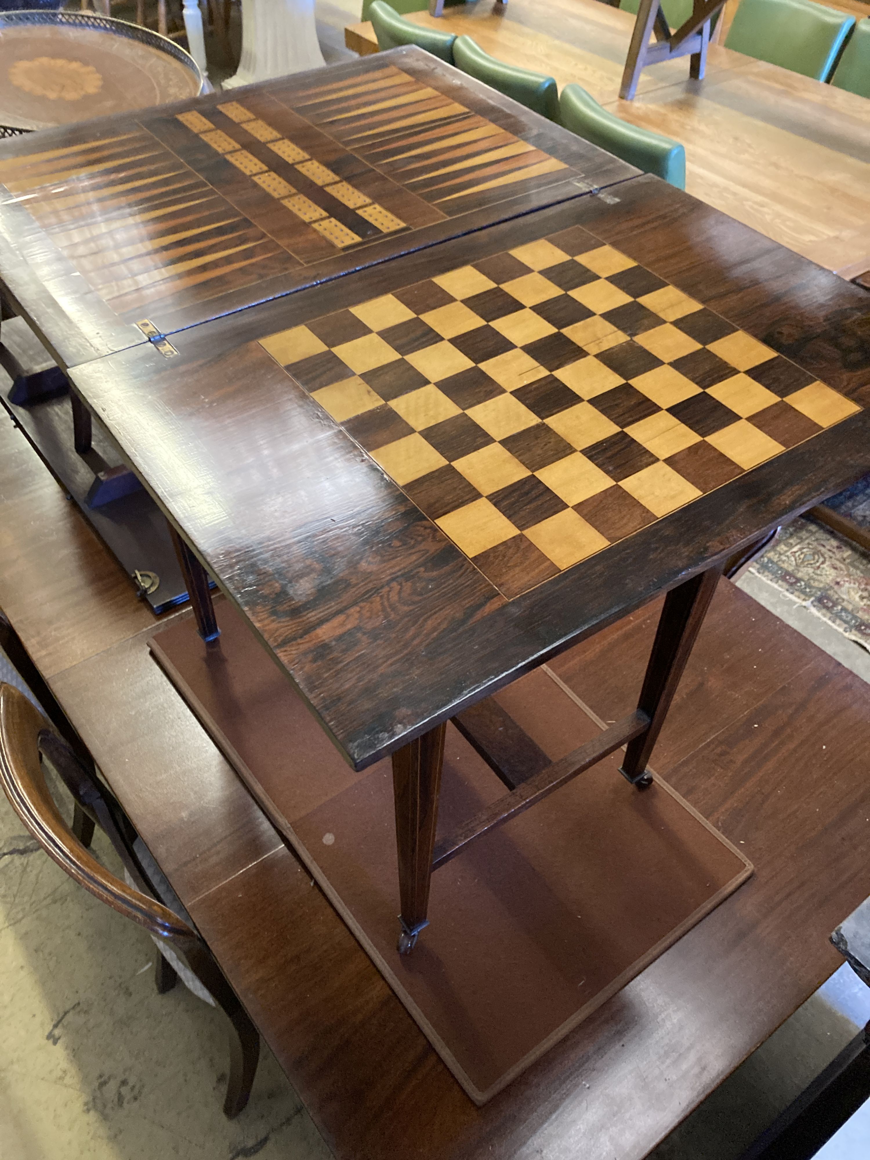 A late Victorian inlaid rosewood games table, width 55cm, depth 40cm, height 71cm
